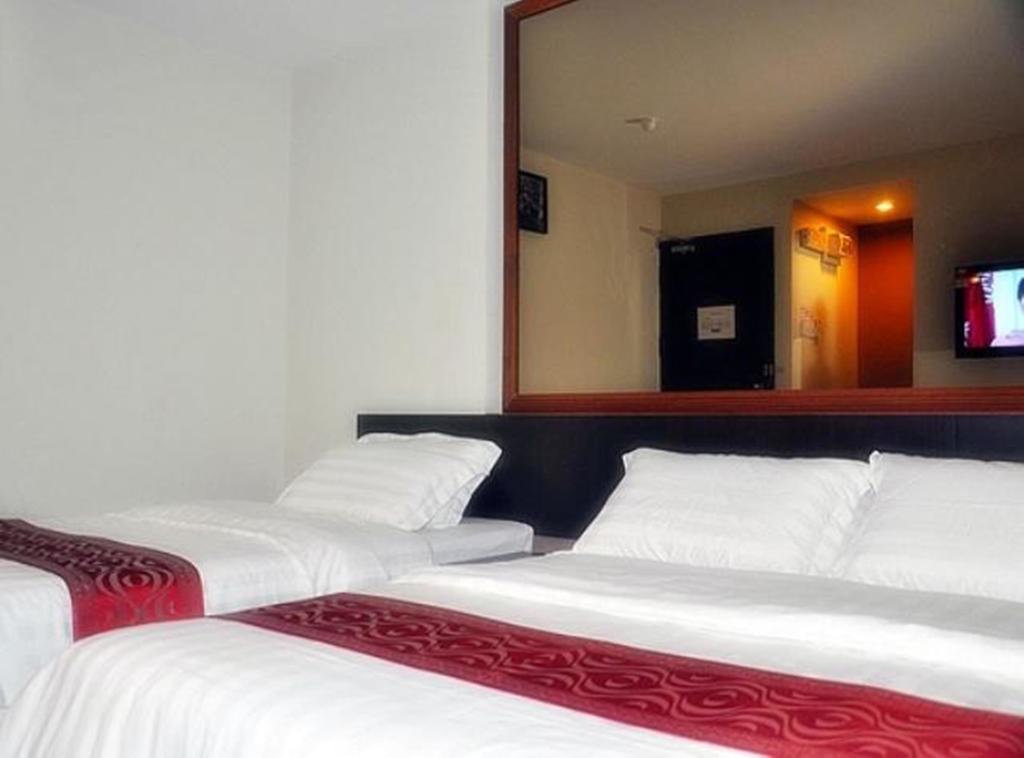 Goldenhill Hotel Кота-Кінабалу Номер фото